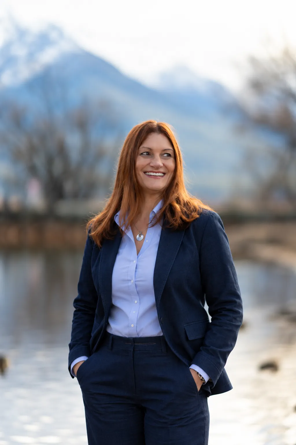 Louise Ridlen smiling by the lake